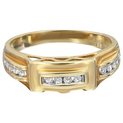 Anello a fascia con diamanti rotondi incastonati a canale da 0,20cttw in oro giallo 14k