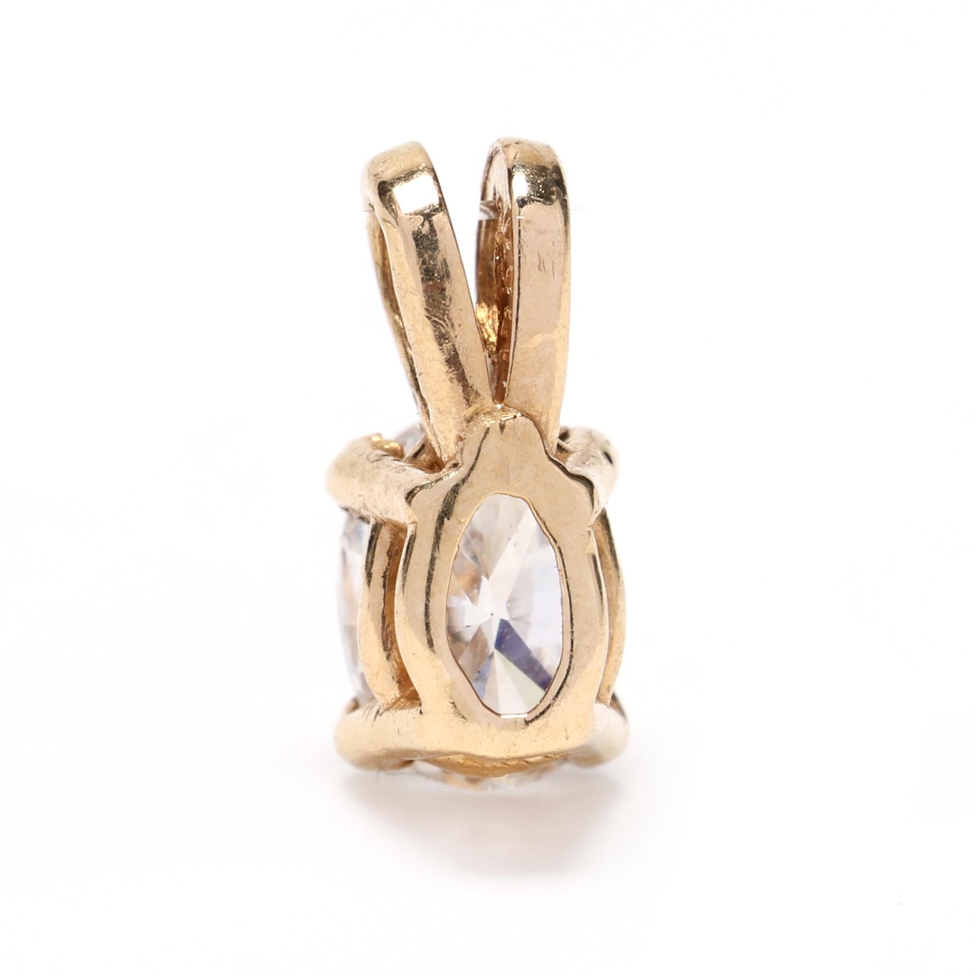 This elegant and dainty charm pendant features a 0.20 carat diamond set in 14k yellow gold, creating a beautiful and timeless piece of jewelry. The sparkle of the diamond adds a touch of luxury and sophistication to any outfit, making it a versatile