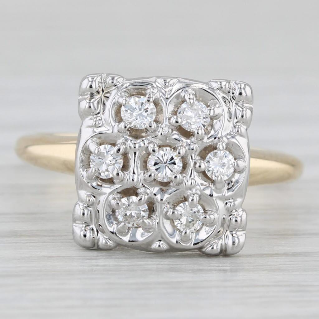 Gemstone Information:
- Natural Diamonds -
Total Carats - 0.20ctw
Cut - Round Brilliant
Color - G - H
Clarity - SI1 - I1

Metal: 14k White & Yellow Gold 
Weight: 4.8 Grams 
Stamps: 14k
Face Height: 11.7 mm 
Rise Above Finger: 9 mm
Band / Shank
