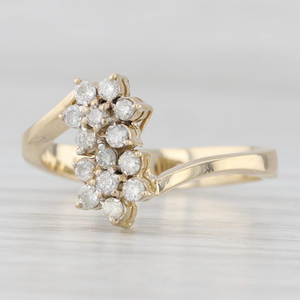 Women's or Men's 0.20ctw Diamond Flower Cluster Bypass Ring 14k Yellow Gold Size 7.25 For Sale