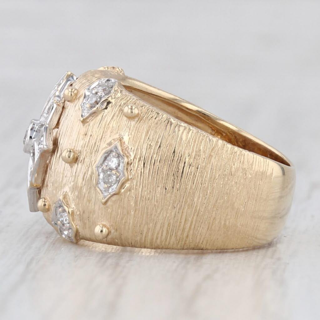 Gemstone Information:
- Natural Diamonds -
Total Carats - 0.20ctw
Cut - Round Brilliant, Single
Color - G - H
Clarity - SI2 - I1

Metal: 14k Yellow & White Gold
Weight: 7.2 Grams 
Stamps: 14k 585
Face Height: 13.7 mm 
Rise Above Finger: 5.8 mm
Band