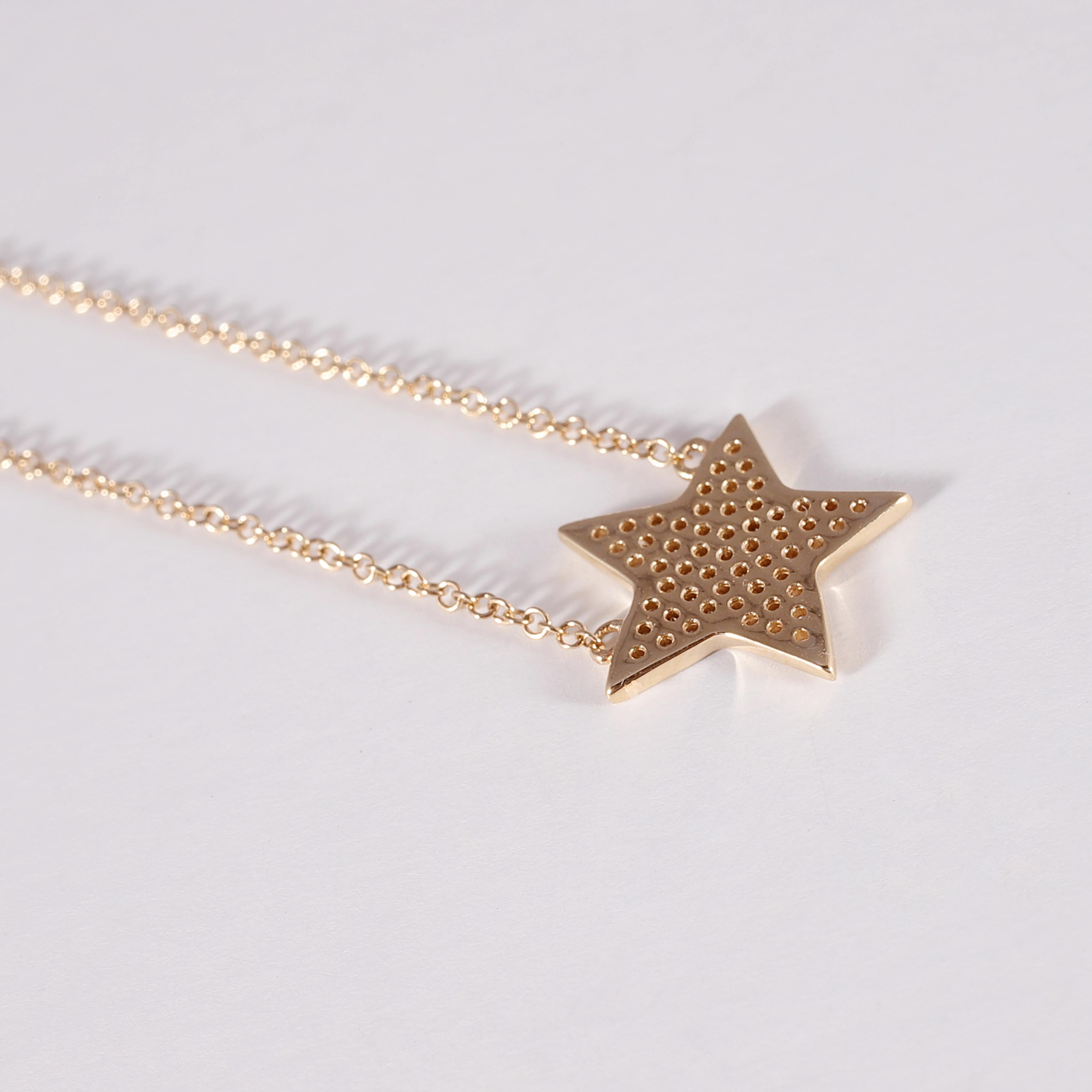 For the star in your life!!  This fun 14 karat yellow gold and 0.21 carat diamond necklace is adjustable - can be 16
