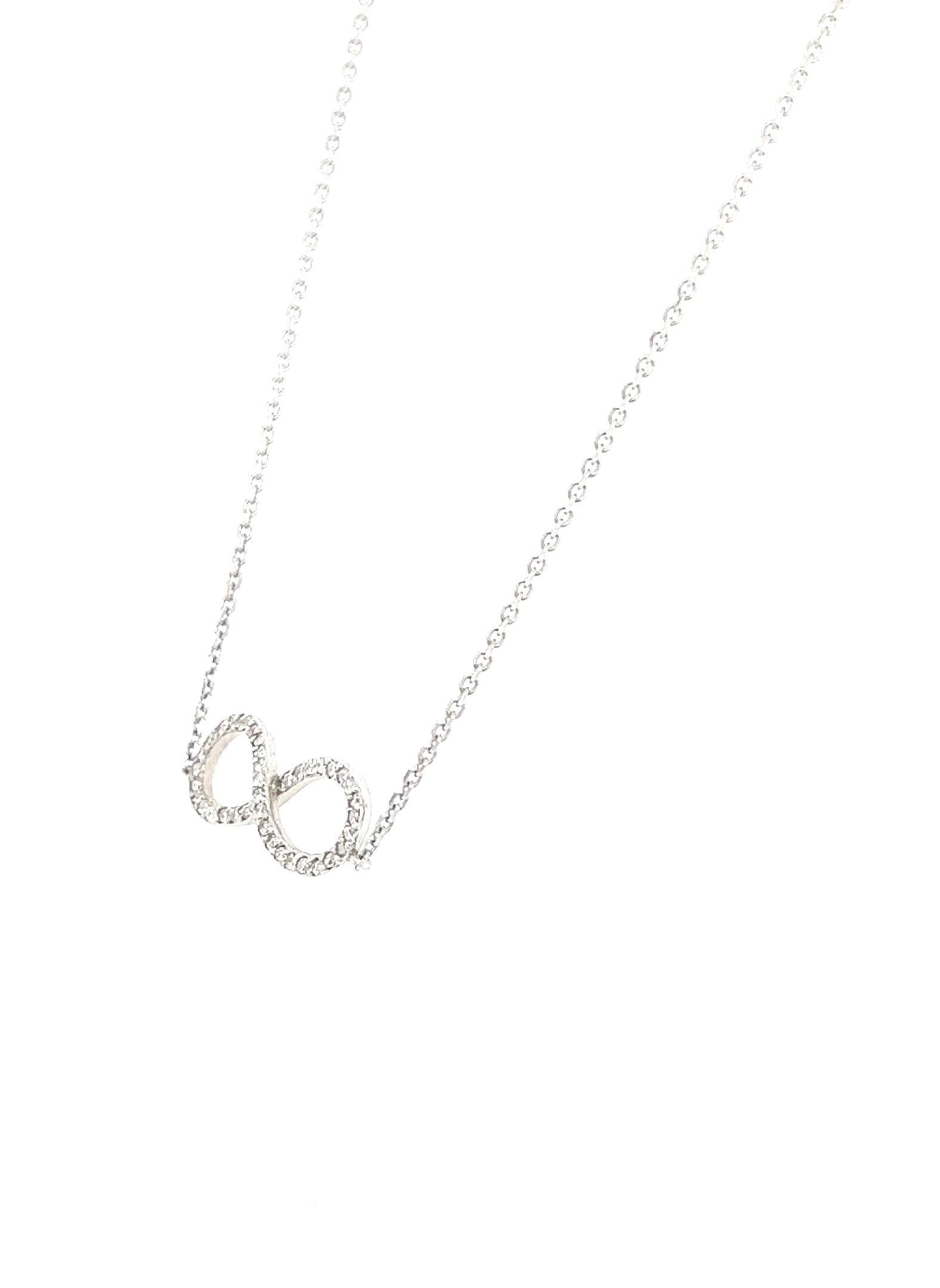 This necklace has Natural Round Cut Diamonds that weigh 0.21 carats. The clarity and color of the diamonds are VS-H.

The necklace is 16 inches in length, weighs approximately 2.5 grams and is set in 14 Karat White Gold. 

This necklace is perfect