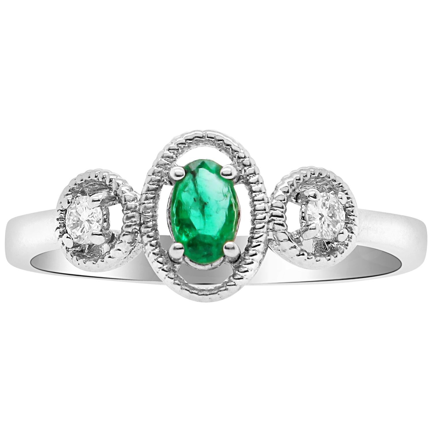 0.21 Carat Oval Emerald and Diamond Ring