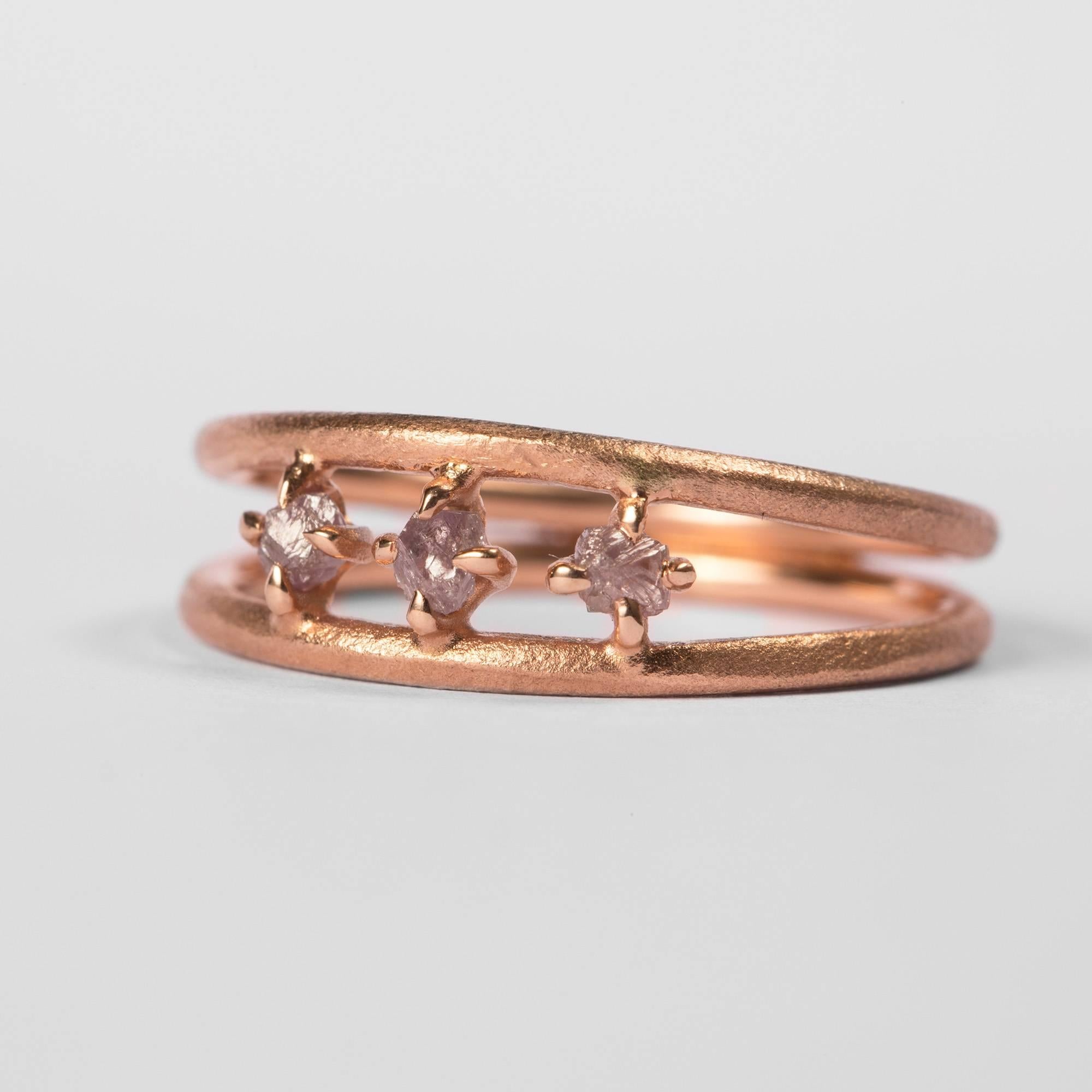 0.21 ct. Natural Light Pink Rough Diamonds in 14K handcrafted double rose gold ring.

Origin of diamonds: Russia

Every rough diamond from Roughdiamonds dk has been personally handpicked by Maya Bjørnsten. The diamonds we reject are sent back to be