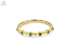 Anello con rubino, smeraldo e zaffiro da 0,21 carati in oro 18 carati