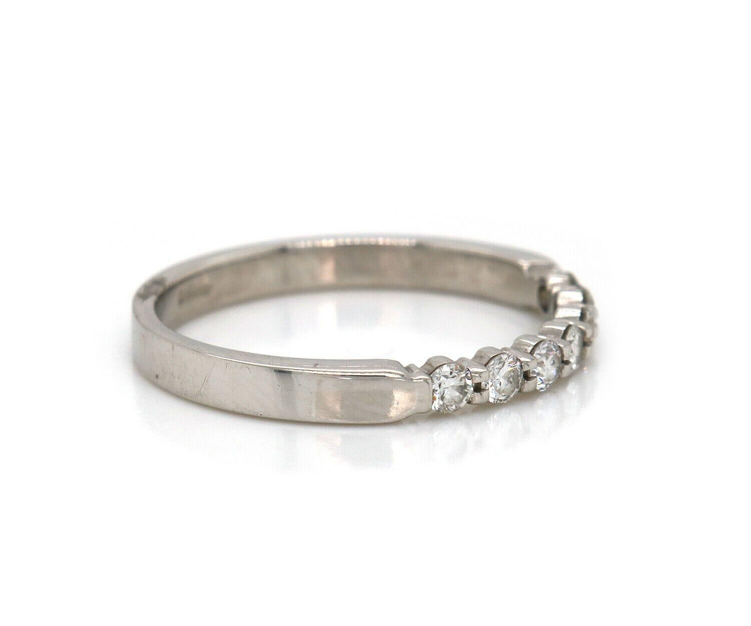 0.21ctw Diamond Shared Prong Wedding Band Ring in Platinum

Diamond Shared Prong Wedding Band Ring
.950 Platinum
Diamonds Carat Weight: Approx. 0.21ctw
Clarity: VS
Color: G
Band Width: Approx. 2.5 MM
Ring Size: 7.0 (US)
Weight: Approx. 3.44