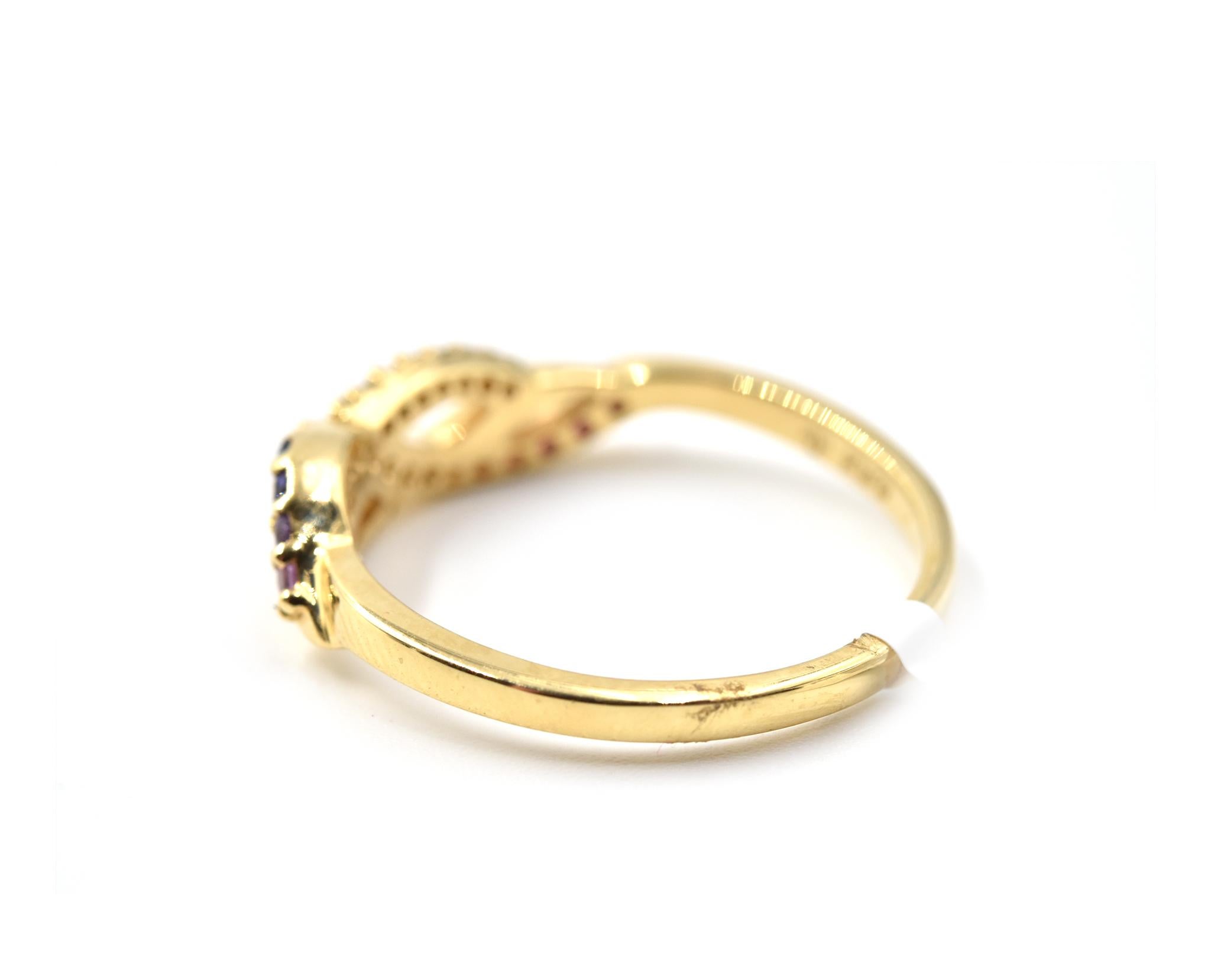 Modern 0.22 Carat Rainbow Sapphire and Diamond 14 Karat Yellow Gold Wave Ring For Sale