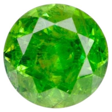 0.22 ct, Russian demantoid garnet with bissolite inclusions For Sale