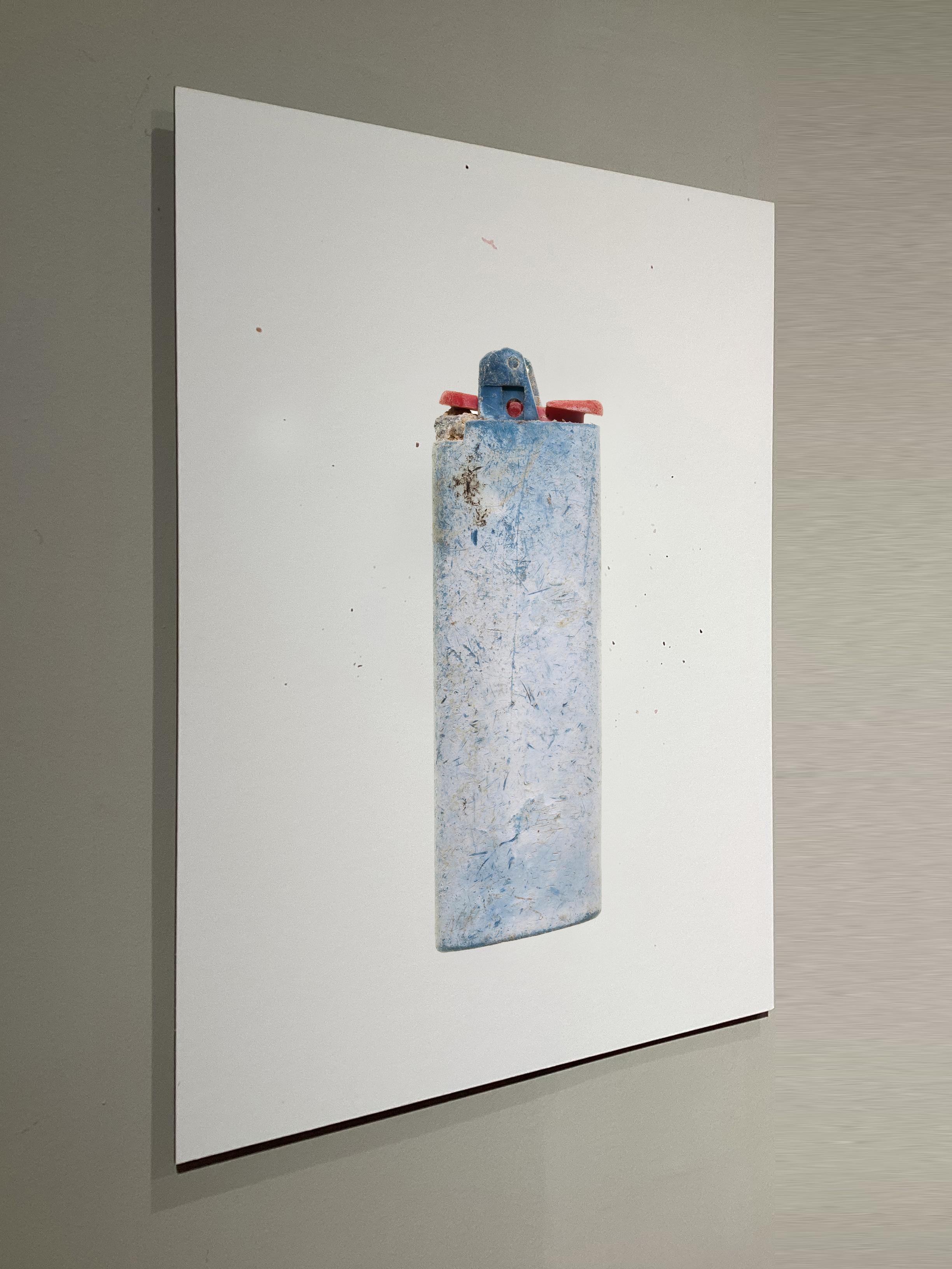 Found-object photograph: lighter recovered on the north coast of Menorca (Balearic Islands).

Original giclée printed on Hahnemühle FineArt Photo Rag 308 gsm — white, matte, acid-free, 100% cotton.

There are places that call to you—sites with a