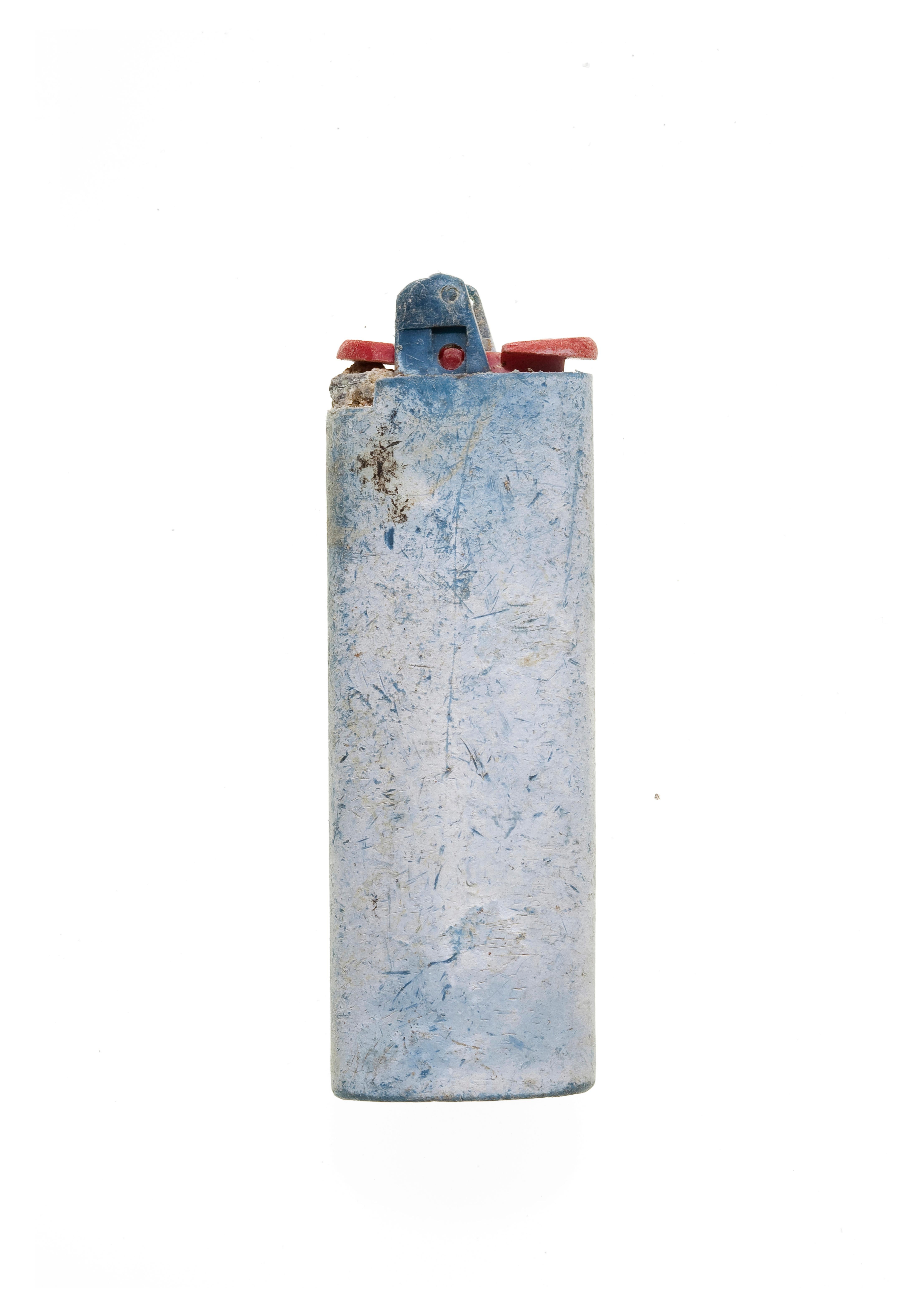 Spanish 0220_Found-object photograph: lighter recovered on the coast of Menorca (Spain) For Sale