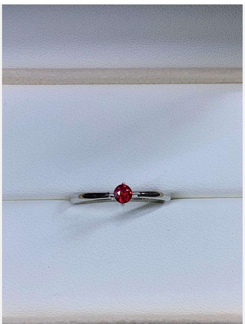 0.22ct Ruby Burma Pigeon Blood Solitaire Engagement Ring In Platinum
This stunning ruby ring boasts a vibrant red hue that is sure to catch anyone's eye. The solitaire setting style allows for the beautiful ruby to be the center of attention, making