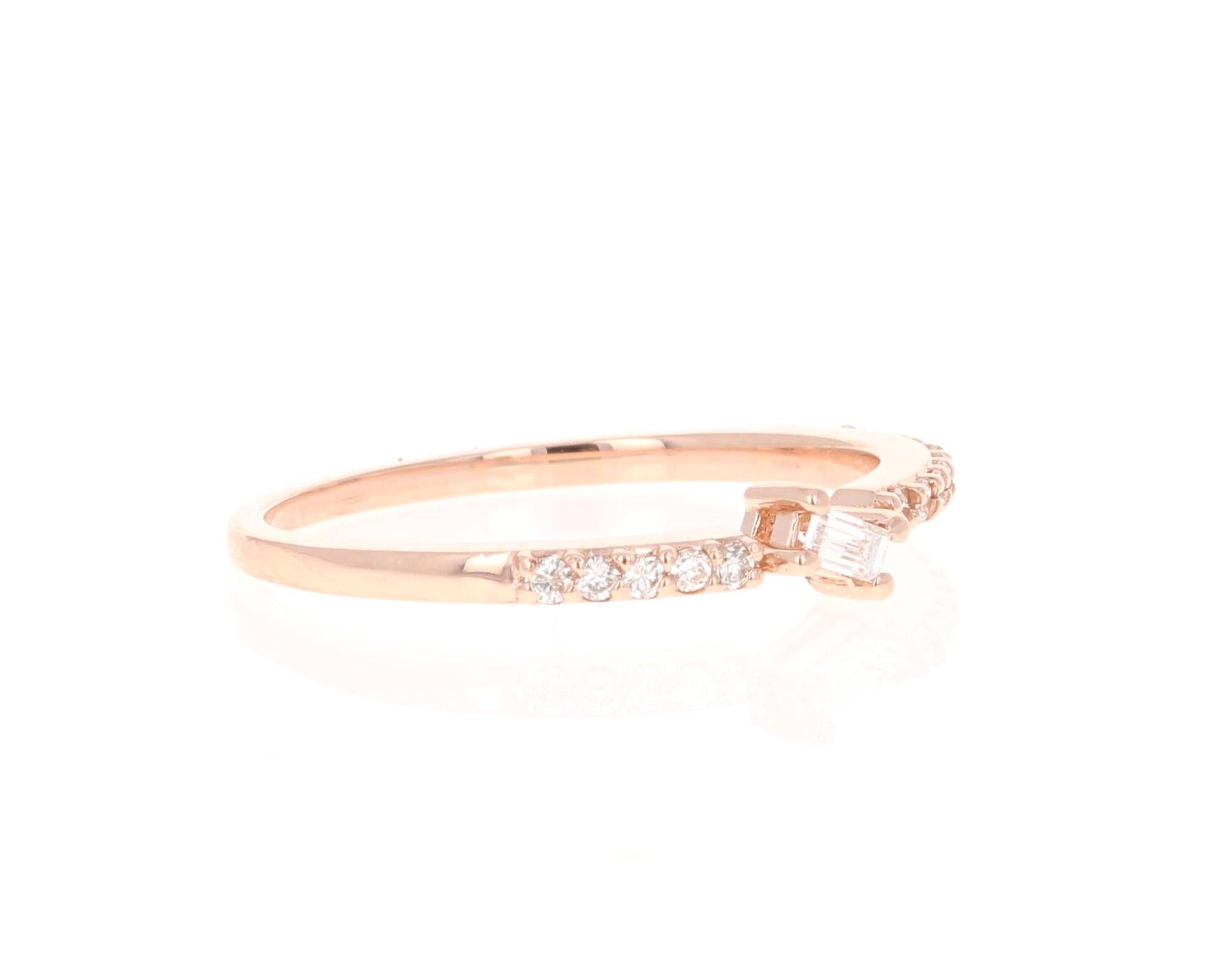 Unique and cute band that can be worn as a single band or stack with other bands in other colors of Gold! 

This ring has 1 Baguette Cut Diamond that weighs 0.07 Carats (Clarity: VS, Color: H) and is embellished with 16 Round Cut Diamonds that weigh