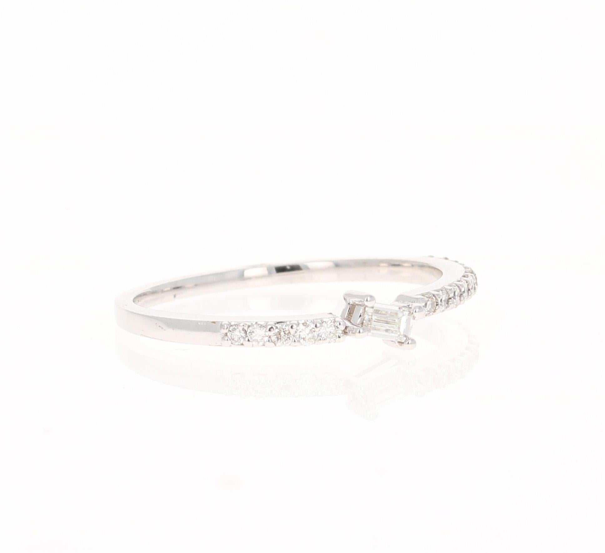 Unique and cute band that can be worn as a single band or stack with other bands in other colors of Gold! 

This ring has 1 Baguette Cut Diamond that weighs 0.07 Carats (Clarity: VS, Color: H) and is embellished with 16 Round Cut Diamonds that weigh