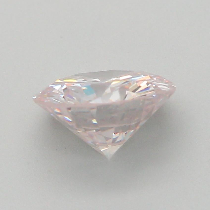 0.72-CARAT, FAINT PINK, ROUND CUT DIAMOND VS1 Clarity GIA Certified For Sale 1