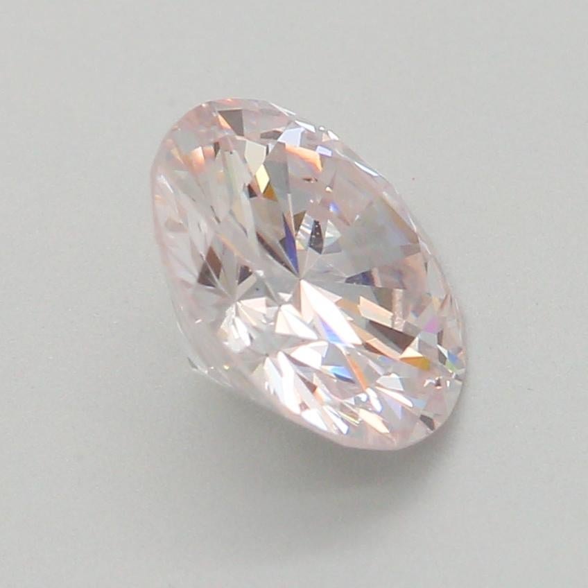 0.72-CARAT, FAINT PINK, ROUND CUT DIAMOND VS1 Clarity GIA Certified For Sale 3