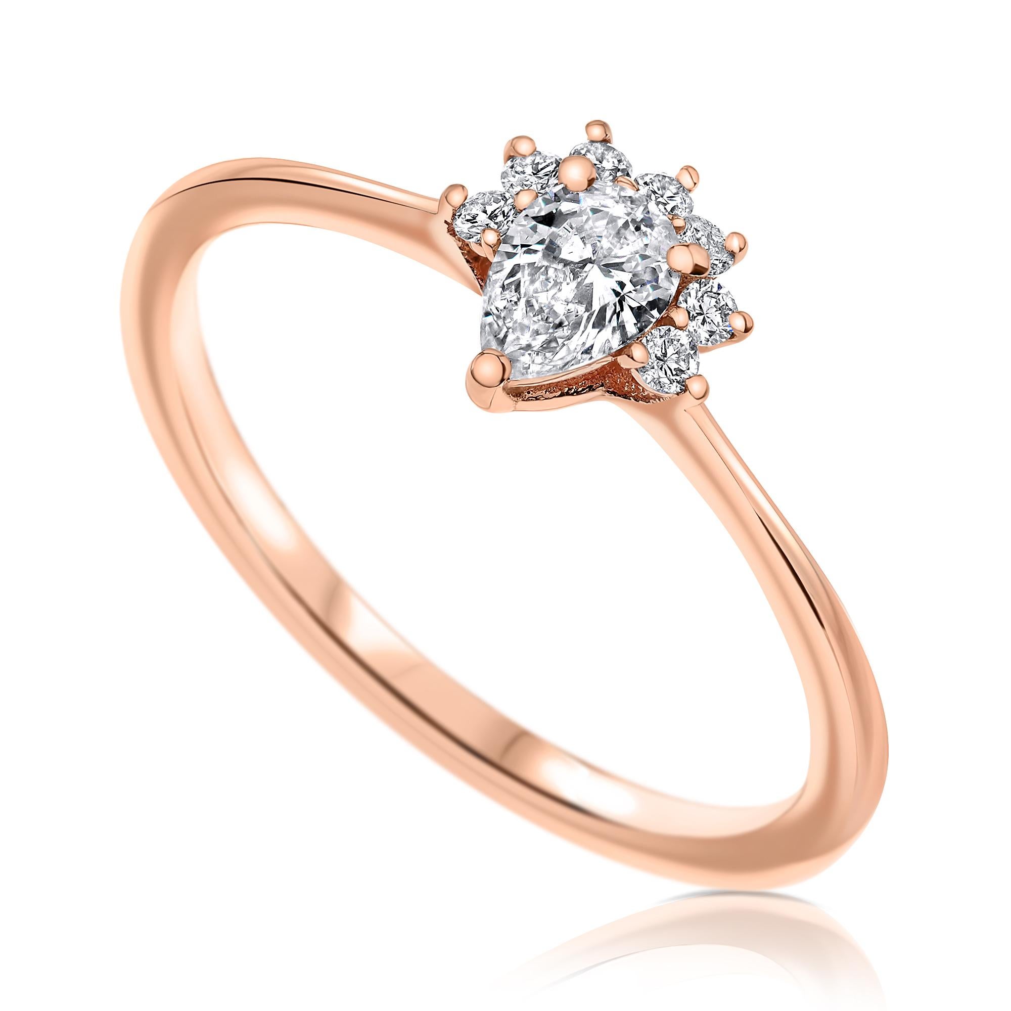 0.23 Carat Pear & Round Cut Diamonds Crown Ring 14K Rose Gold - Shlomit Rogel

This dainty ring is full of shine! Crafted from 14k rose gold, this ring features a pear shaped diamond surrounded by 7 round diamonds. It's elegant and chic and can be