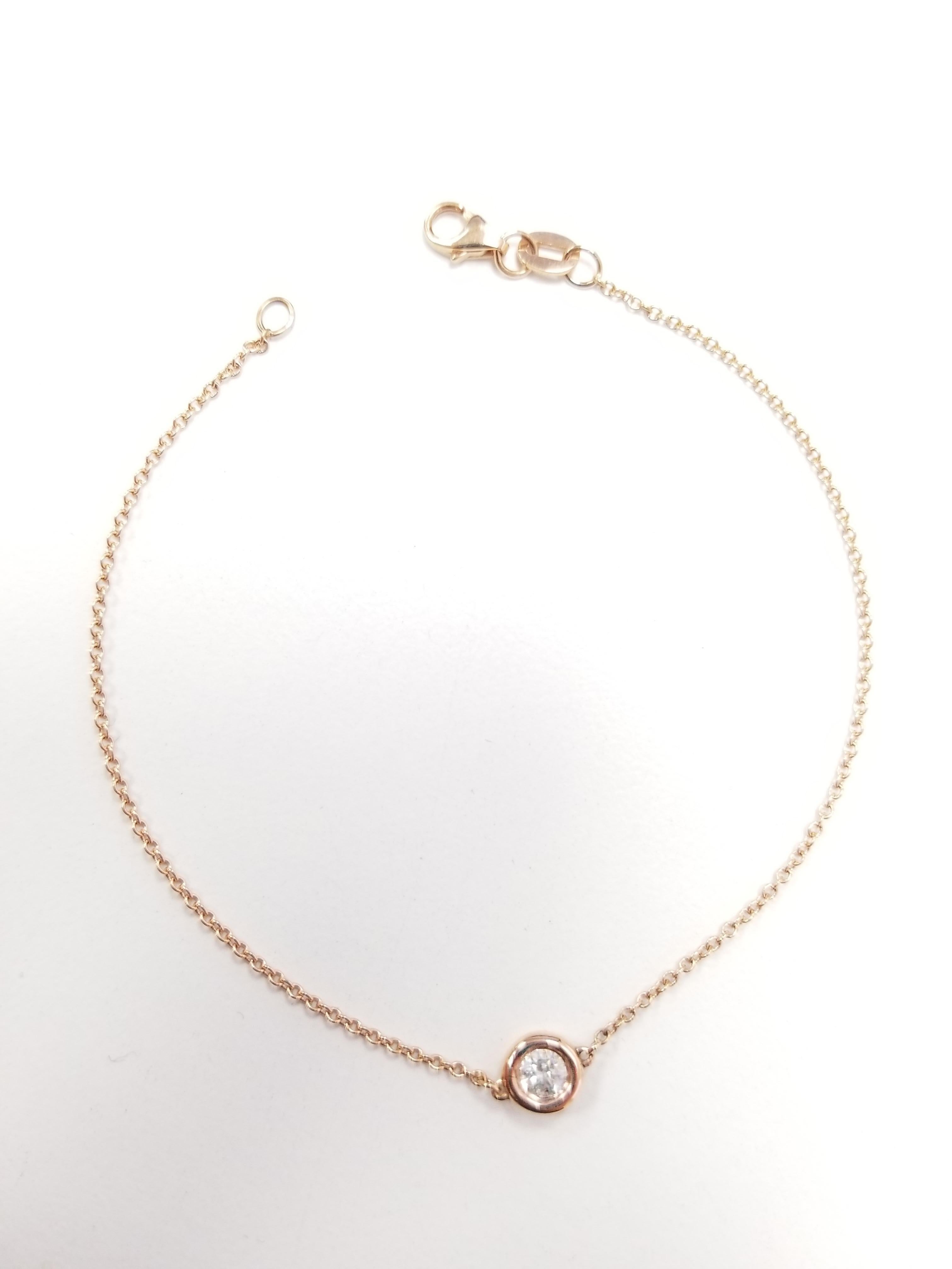 A stunning and classic bracelet perfect for everyday wear combined or simply on it's own.  A 0.23 ct White Diamond is handset in an 14k bezel and attached to a dainty chain with and clasp from 7 inch.  The bracelet is hand polished with a shiny