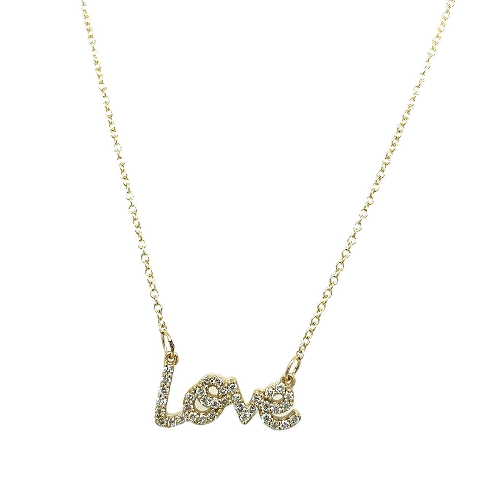 This Love pendant necklace is set with 0.23ct of diamonds and is the perfect gift for a loved one. The pendant is suspended from a 16
