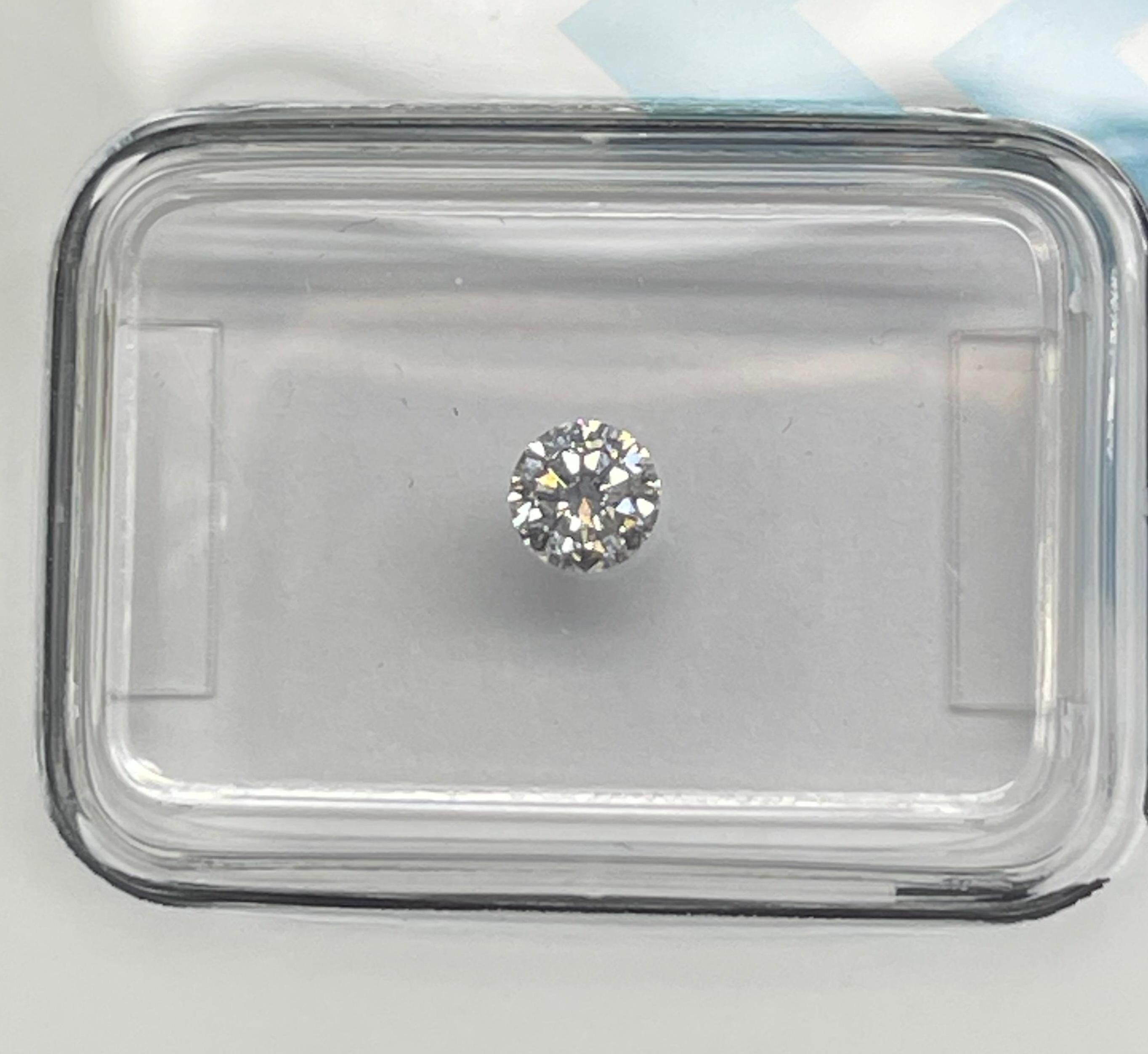 Natural Diamond graded by IGI.

Shape: Round Brilliant
Weight: 0.23 CT
Color: D
Clarity: VVS2
Cut: Very Good
Polish: Very Good
Symmetry: Excellent
Fluorescence: None
Laser inscription : IGI 630434205