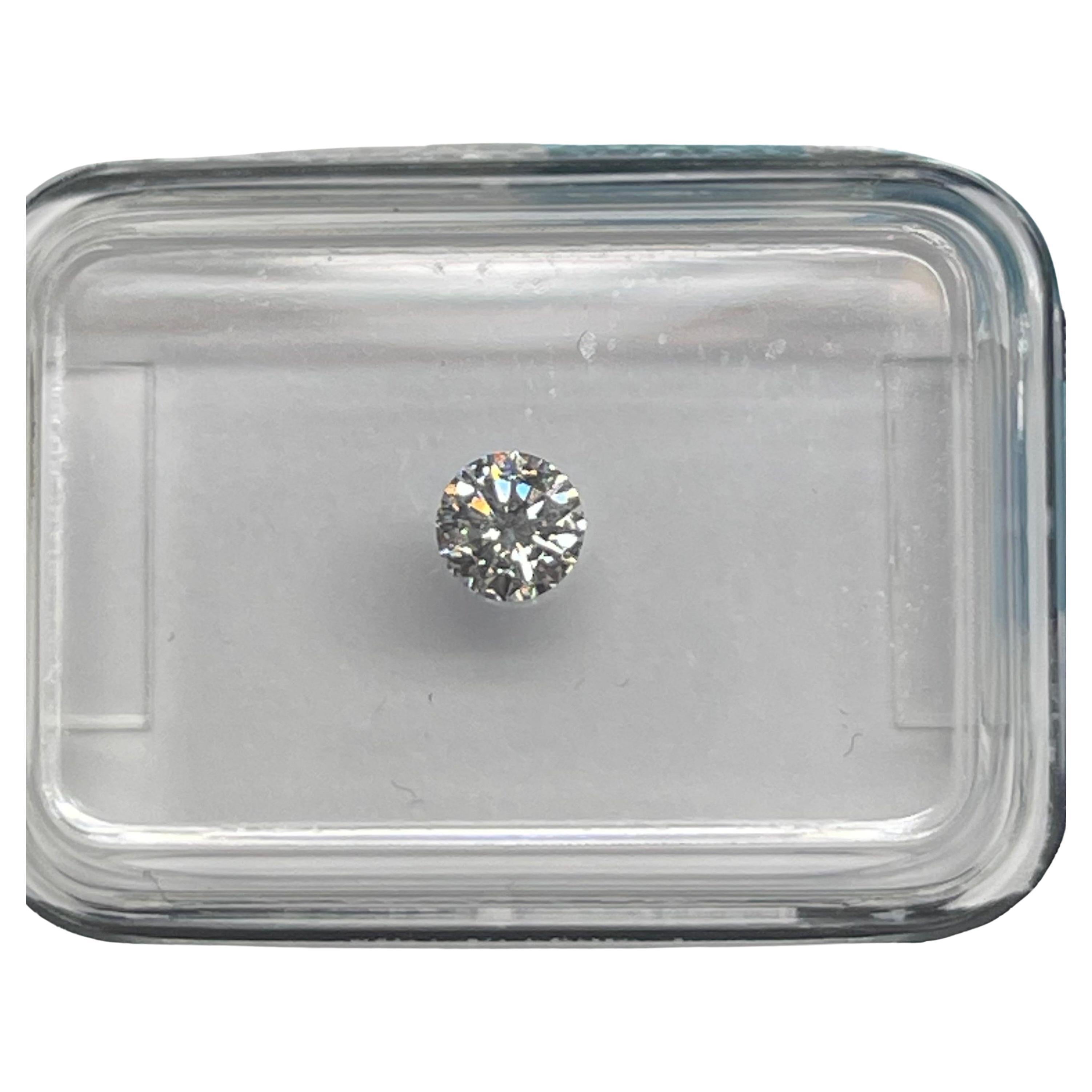 Natural Diamond graded by IGI.

Shape: Round Brilliant
Weight: 0.23CT
Color: E
Clarity: SI1
Cut: Very Good
Polish: Excellent
Symmetry: Excellent
Fluorescence: Very Slight
inscription : IGI 630434189