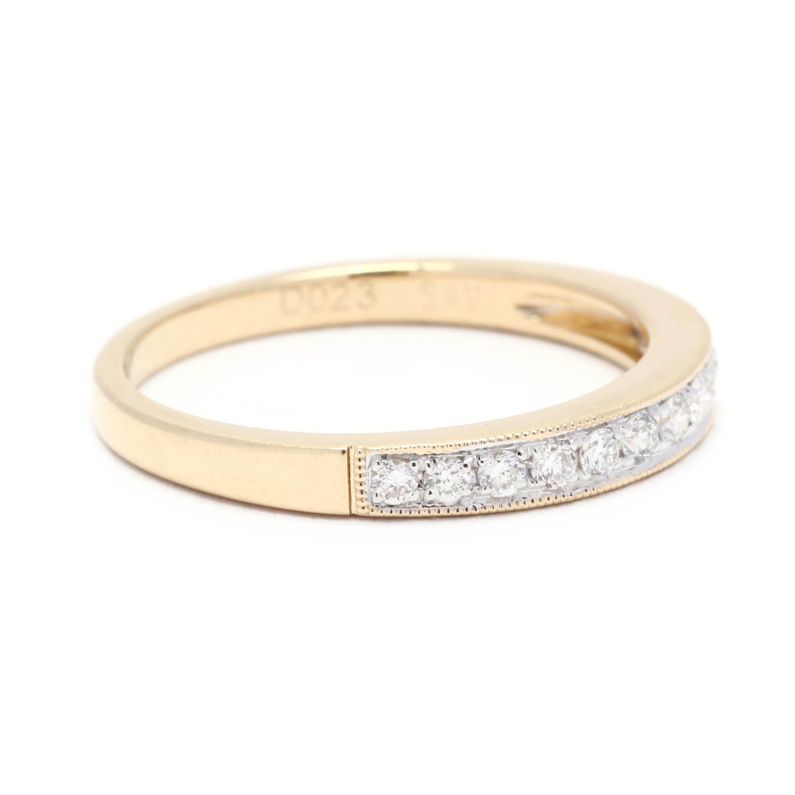 This delicate and beautiful diamond wedding band is the perfect addition to any stackable ring collection. Made with 14K yellow gold, this ring features a total of 0.23 carats of round cut diamonds. The diamonds are prong-set in a thin band,