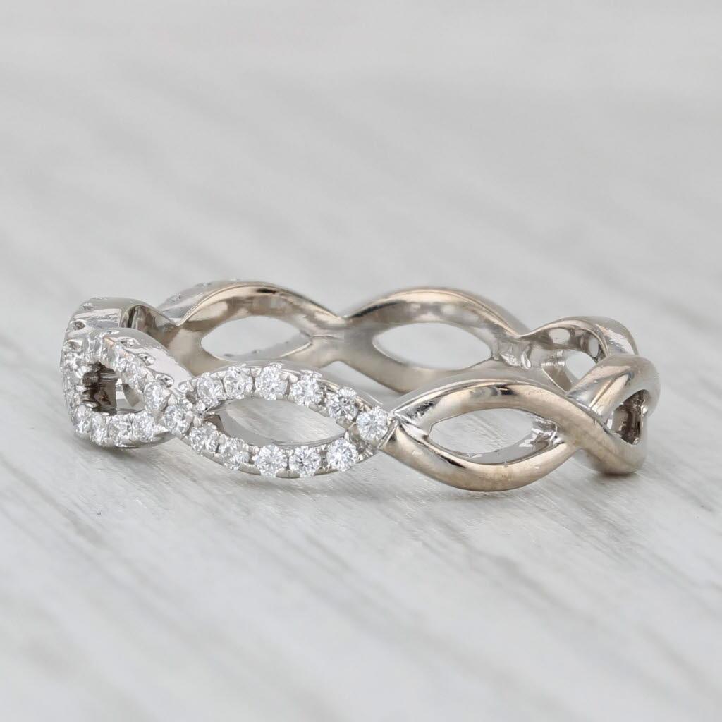 Gemstone Information:
- Natural Diamonds -
Total Carats - 0.23ctw
Cut - Round Brilliant
Color - F - G
Clarity - VS2

Metal: 14k White Gold
Weight: 2.7 Grams 
Stamps: 14k
Face Height: 4 mm 
Rise Above Finger: 2.1 mm
Band / Shank Width: 4 mm

This