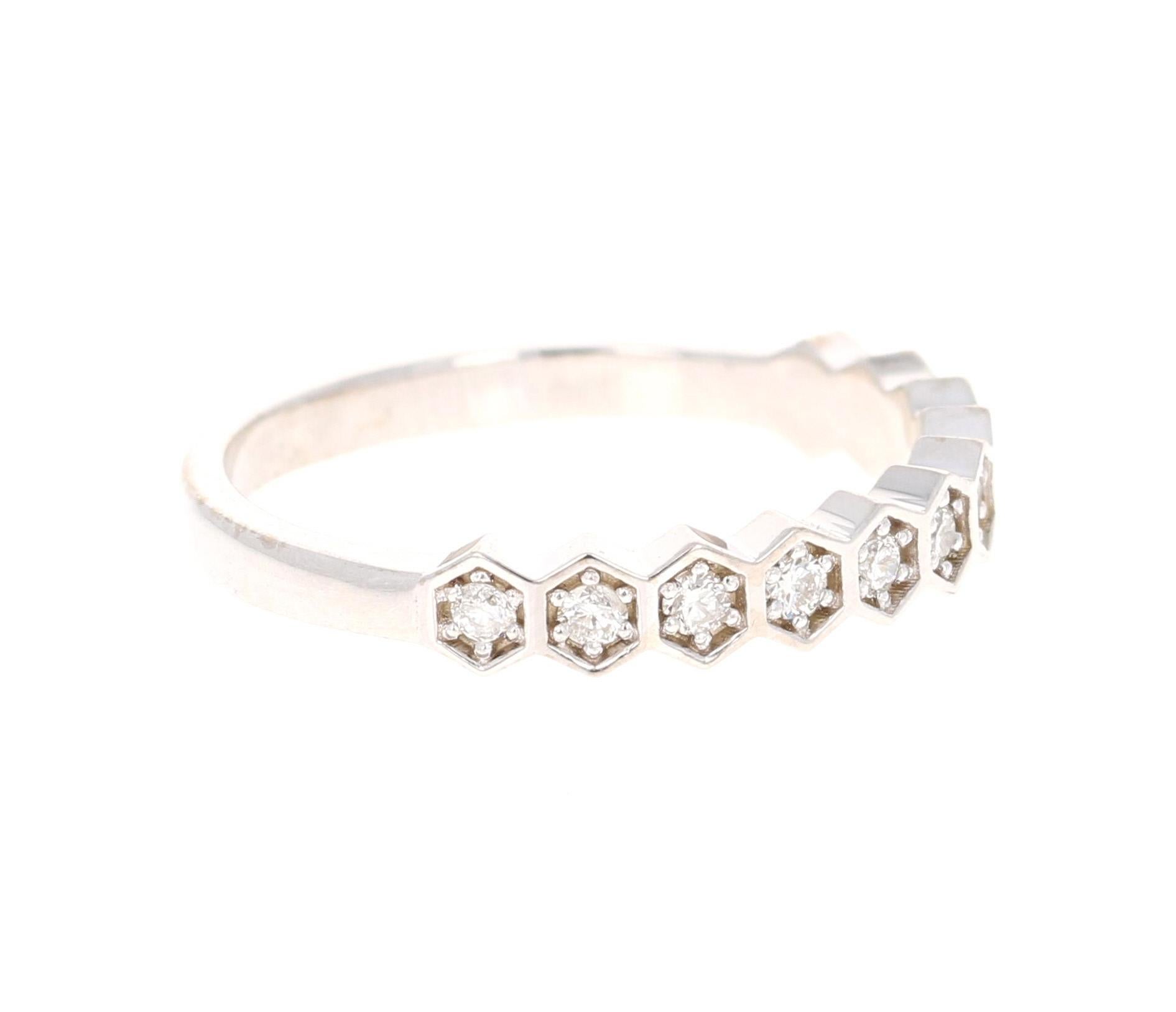 Cute and dainty 0.24 Carat Diamond band that is sure to be a great addition to anyone's accessory collection.   There are 11 Round Cut Diamonds that weigh 0.24 carats (Clarity: SI, Color: F)
The band is made in 14K White Gold and weighs