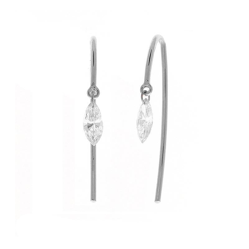 These ultra chic diamond earring threaders feature two marquise cut diamonds that dangle totaling 0.24 carats and have F (colorless) color and SI1 clarity. These brilliant diamonds are set on a small jump ring with an expertly made drill hole and
