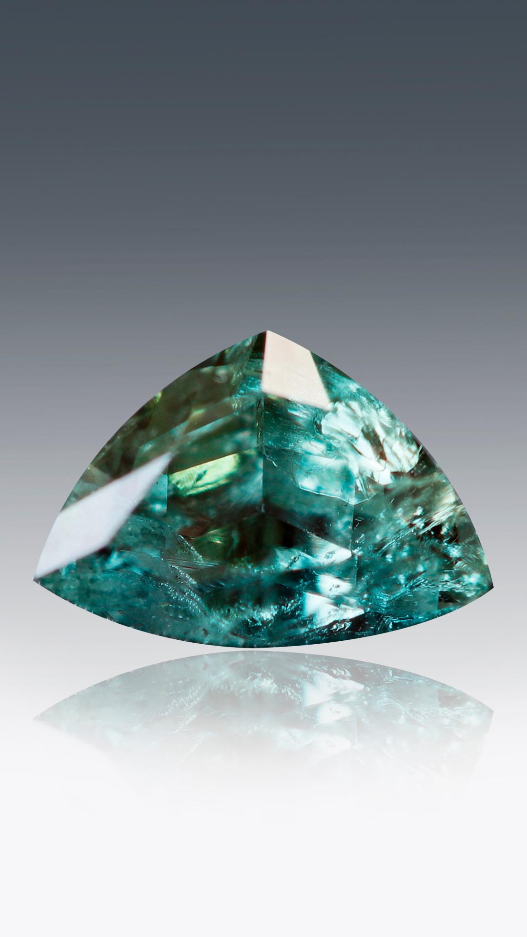 Introducing a captivating piece of nature's marvel, this exquisite listing showcases a mesmerizing 0.24 ct weight triangular-shaped natural Russian Alexandrite. 

The natural Russian Alexandrite is renowned for its remarkable color-changing