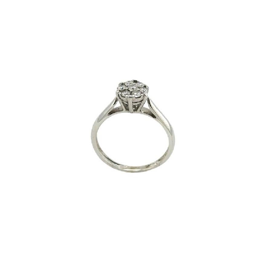 0.24ct, White Gold, Cluster Ring Set With 7 Round Brilliant Diamonds

Additional Information:
Total Diamond Weight: 0.24ct
Diamond Colour: H/I
Diamond Clarity: SI
Total Weight: 2.6g
Ring Size: J
SMS3311