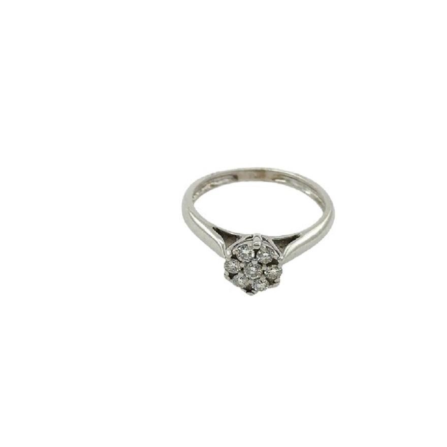0.24ct 7 Round Brilliant Diamond Cluster Ring in 9ct White Gold In Excellent Condition For Sale In London, GB