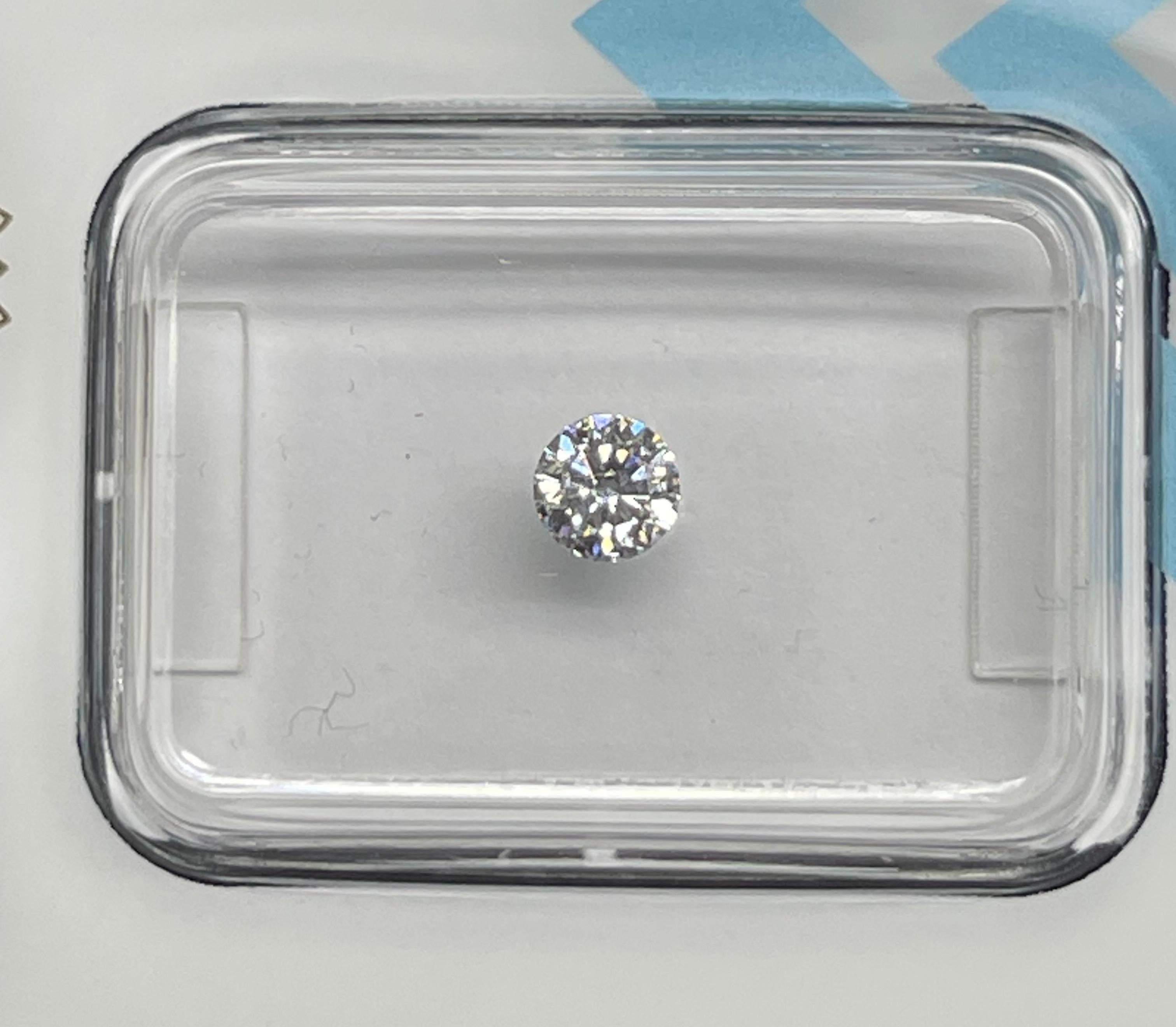 Natural Diamond graded by IGI.

Shape: Round Brilliant
Weight: 0.24 CT
Color: D
Clarity: VS2
Cut: Very Good
Polish: Very Good
Symmetry: Excellent
Fluorescence: None
Laser inscription : IGI 630434204