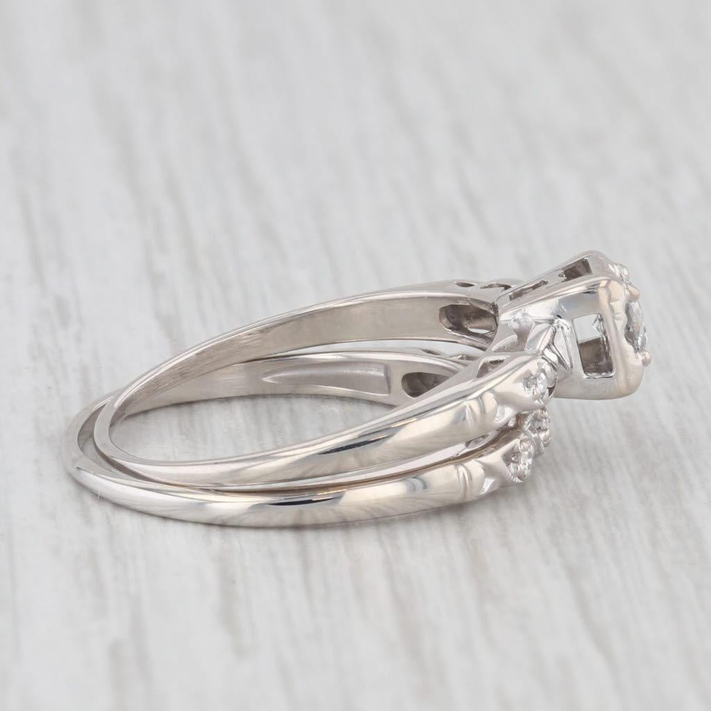 Gemstone Information: Natural Diamonds - 0.24 Total Carats
- Engagement -
Total Carats - 0.21ctw
Cut - Round
Color - E - F
Clarity - VS2

- Wedding -
Total Carats - 0.03ctw 
Cut - Single
Color - G - H 
Clarity - VS2

Metal: 14k White Gold
Weight: