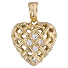 Pendentif cœur en or jaune 18 carats avec treillis de diamants 0,24 carat