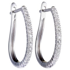 0.25 Carat 14 Karat White Gold Diamond Oval Hoop Earrings