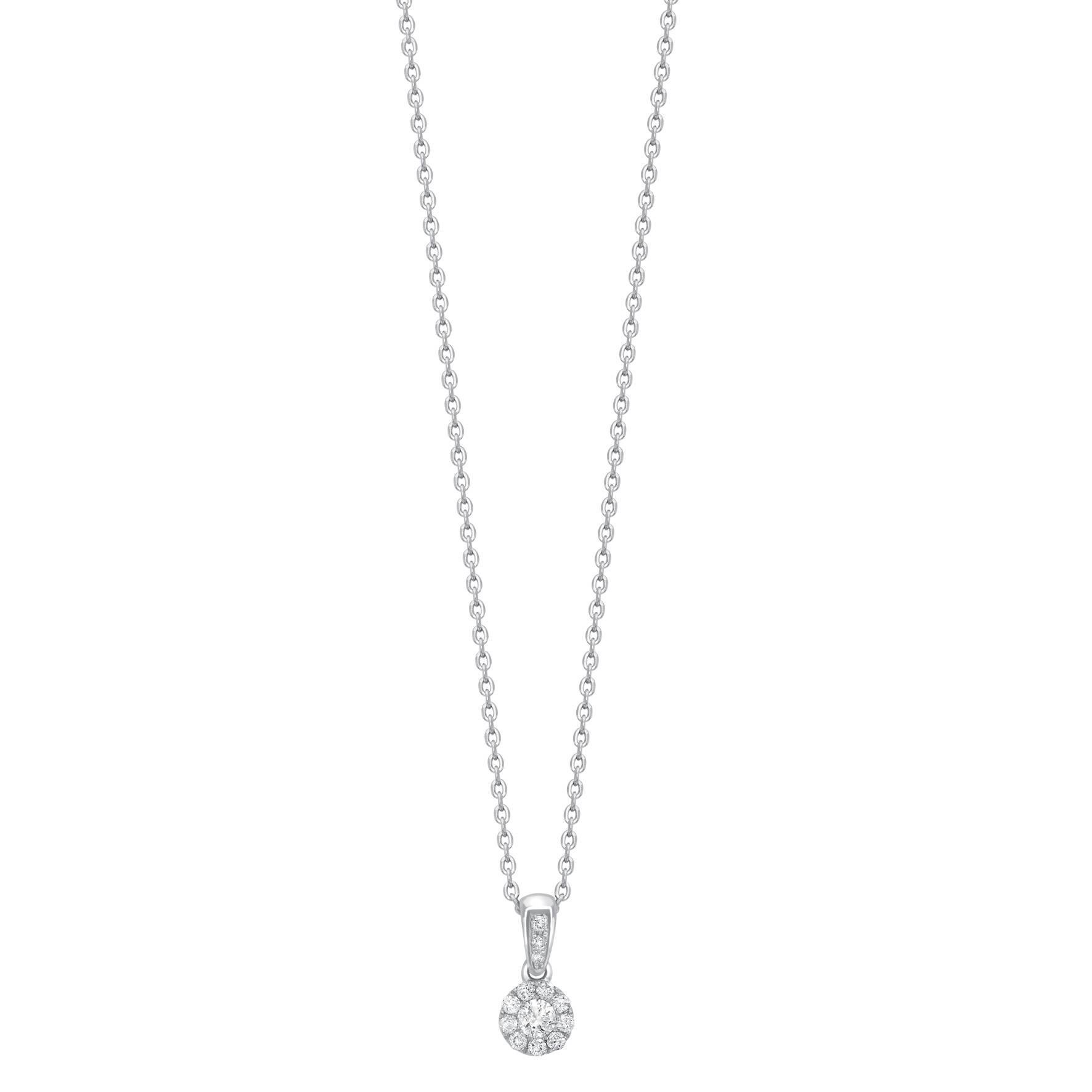 The height of sophistication. This delicate 4mm Round Brilliant Diamond pendant glistens with the diamonds highlighted by the 18 Karat White Gold setting. H-SI white diamonds in a round cluster with a pave set on the chain connector. The center