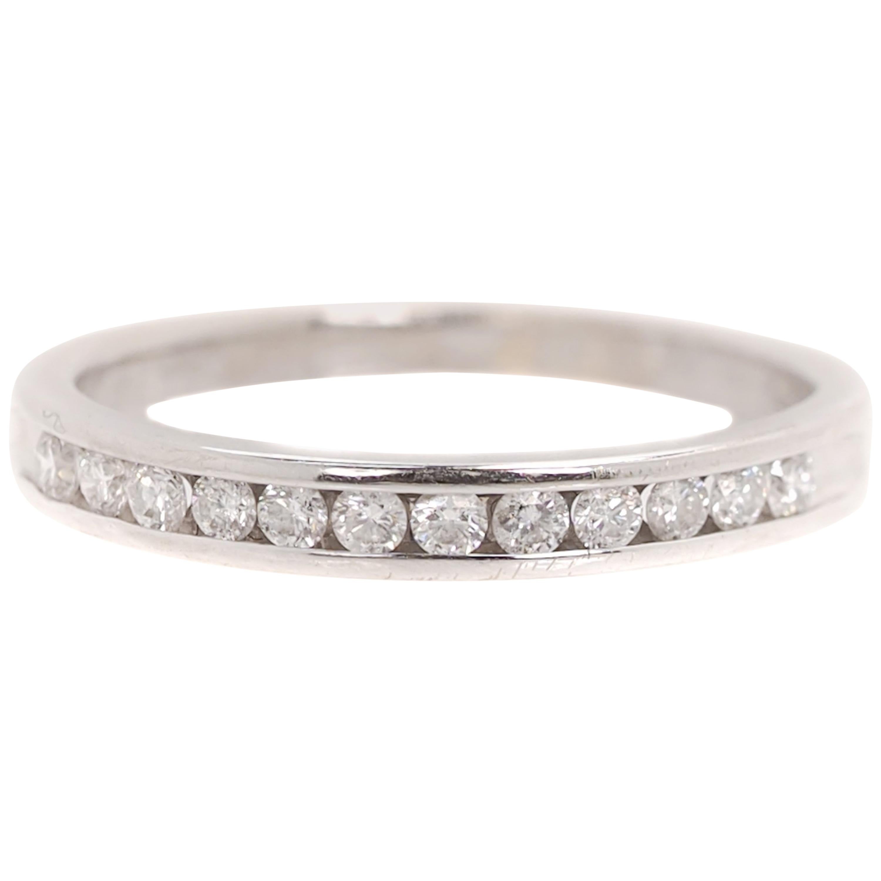 0.25 Carat Diamond and 14 Karat White Gold Wedding Band