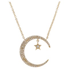 Collier pendentif croissant de lune et étoile en or jaune avec diamants de 0,25 carat
