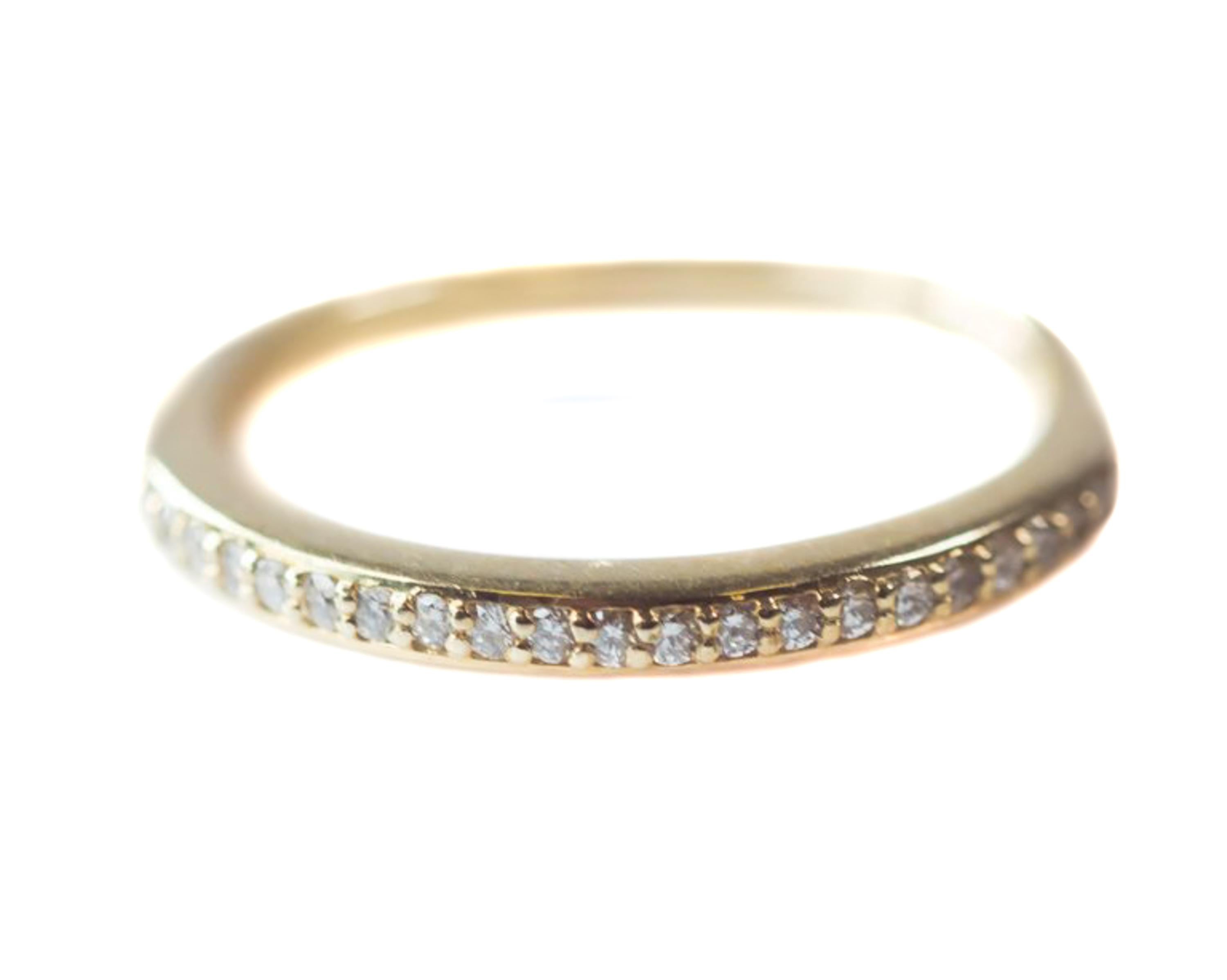 14 Karat Yellow Gold and 0.25 carat total weight Diamond Eternity Band - Halfway around eternity band

Features 0.25 cttw Round Brilliant Diamonds prong set in 14K Yellow Gold. The front half of the ring is covered in Diamonds. The back half of the