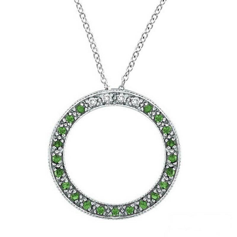 
0.25 Carat Natural Diamond & Tsavorite Circle Pendant Necklace 14K White Gold

    100% Natural Diamonds and Tsavorites
    0.25CT
    G-H 
    SI  
    14K White Gold   Prong style  2.7 gram
    6/8 inches in diameter
    4 diamonds - 0.04ct, 21