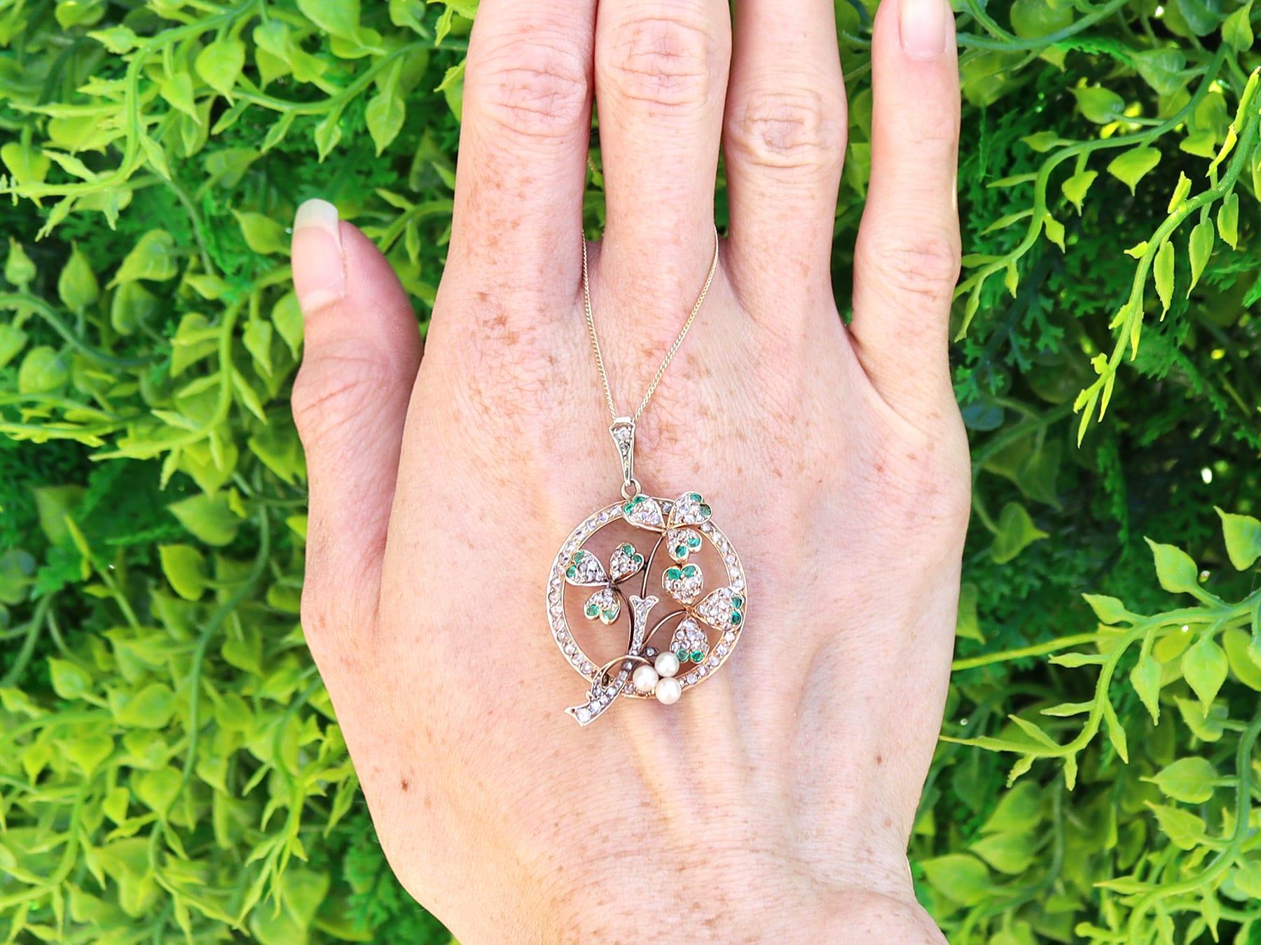 A stunning, fine and impressive antique 0.25 carat emerald, 0.48 carat diamond, pearl and 15 karat yellow gold pendant; part of our diverse Victorian jewelry collection.

This stunning, fine and impressive Victorian pendant has been crafted in 15k