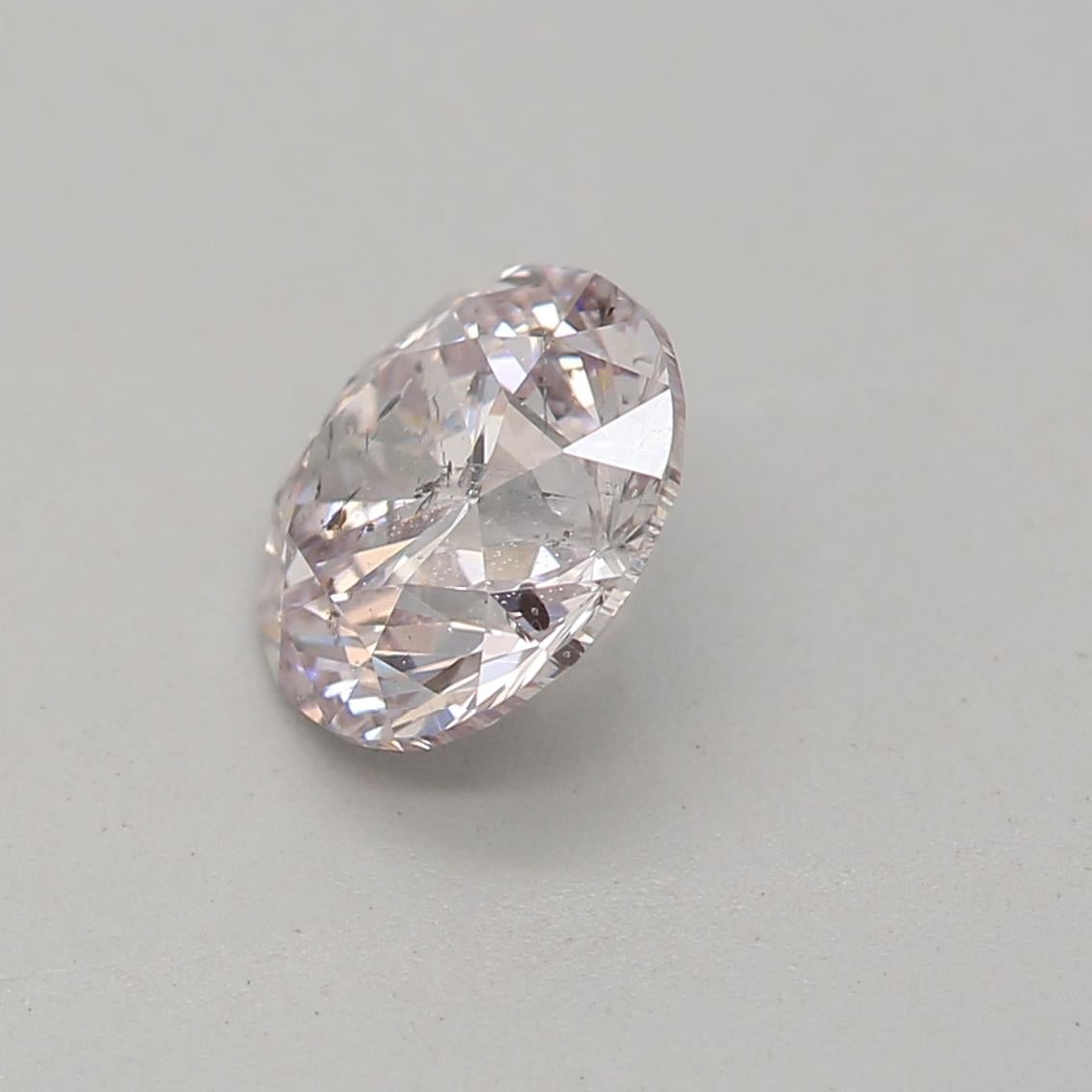 Taille ronde Diamant rose très clair de 0,70 carat de taille ronde I1 de pureté certifié GIA en vente