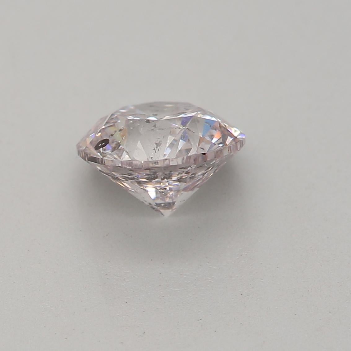 0.70 Carat Very Light Pink Round cut diamond I1 Clarity GIA Certified In New Condition For Sale In Kowloon, HK