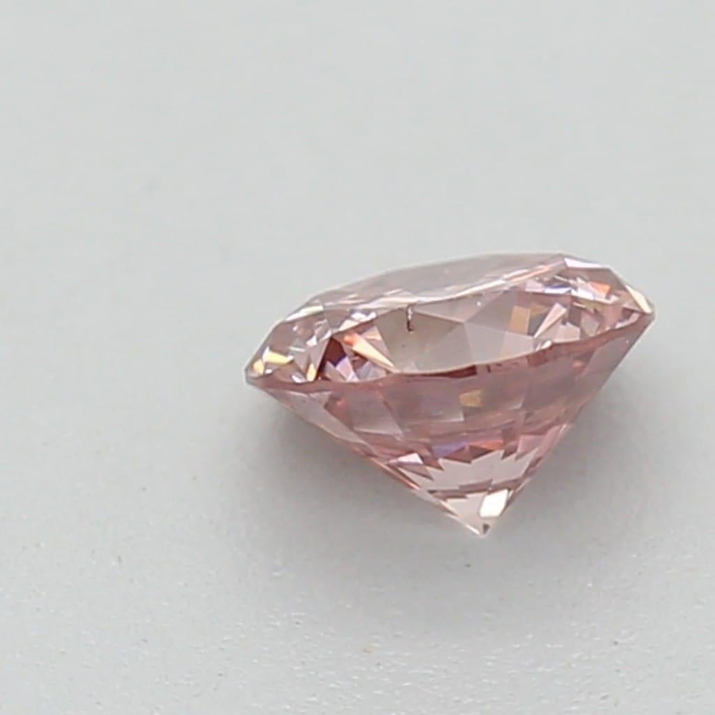 *100% NATURAL FANCY COLOUR DIAMOND*

✪ Diamond Details ✪

➛ Shape: Round
➛ Colour Grade: Fancy Orangy Pink
➛ Carat: 0.25
➛ Clarity: SI2
➛ GIA Certified 

^FEATURES OF THE DIAMOND^

This fancy orangy-pink diamond is a rare and exquisite diamond known