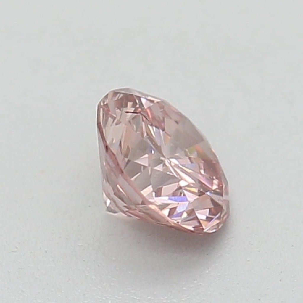 Women's or Men's 0.25 Carat Fancy Orange Pink Round Cut Diamond SI2 Clarity GIA Certified For Sale