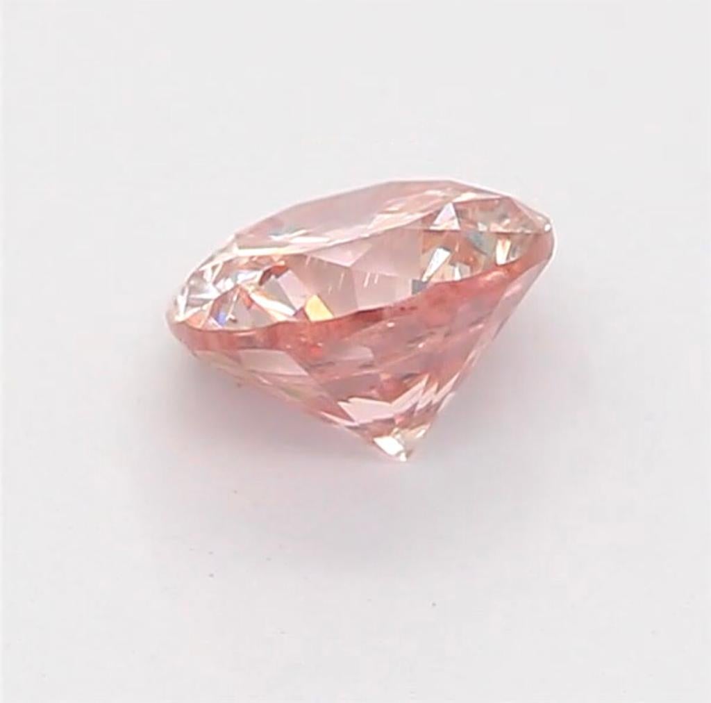 0.25 Carat Fancy Orangy Pink Round Shaped Diamond I1 Clarity CGL Certified For Sale 1
