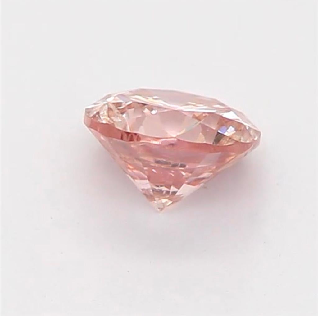 0.25 Carat Fancy Orangy Pink Round Shaped Diamond I1 Clarity CGL Certified For Sale 3