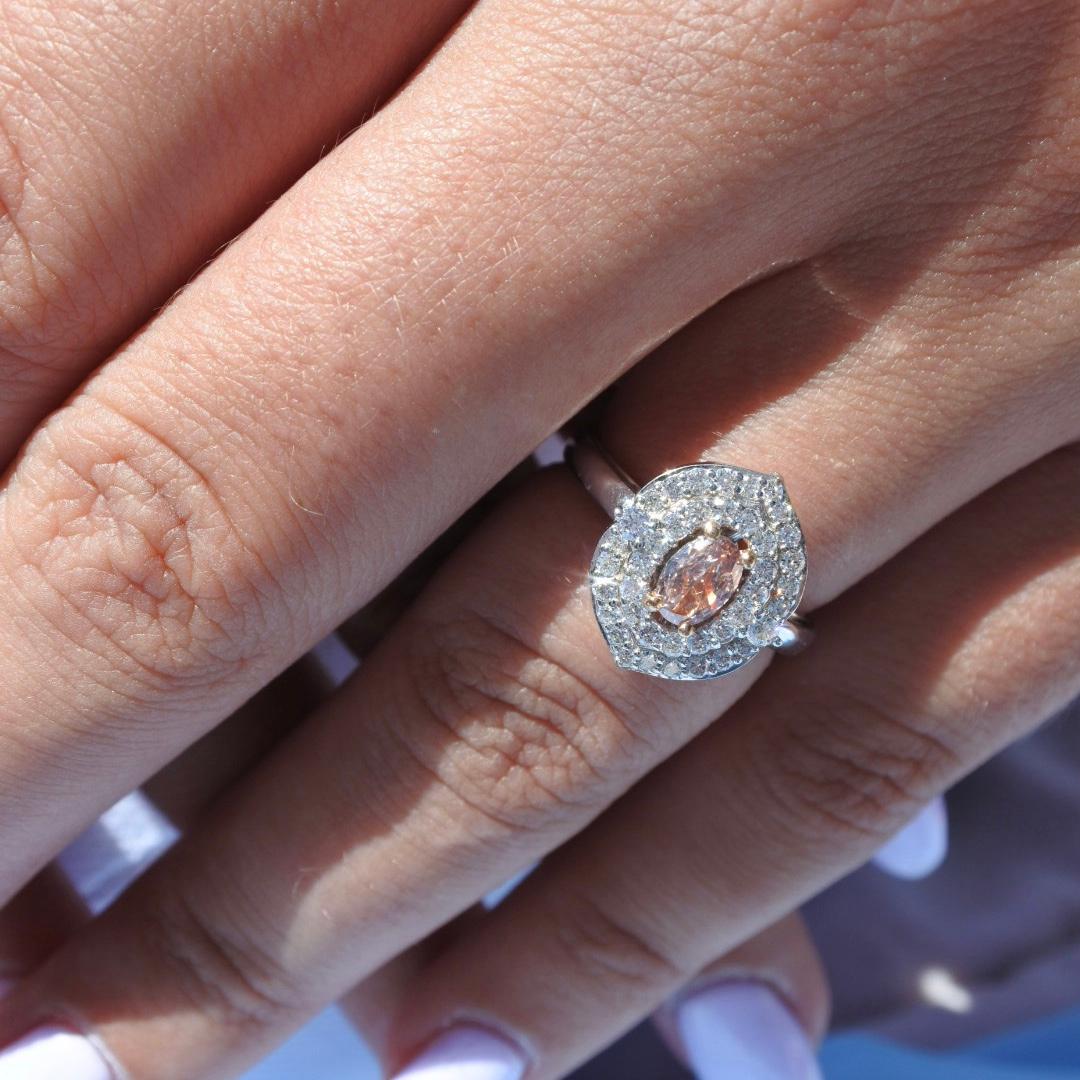 0.25 Carat GIA Certified Rare Natural Fancy Orange Pink Diamond Ring - Shlomit Rogel

This setting features a beautiful and rare 0.25 CARAT oval cut GIA certified natural fancy orangy pink diamond and showcases the colour diamond just right! Looks