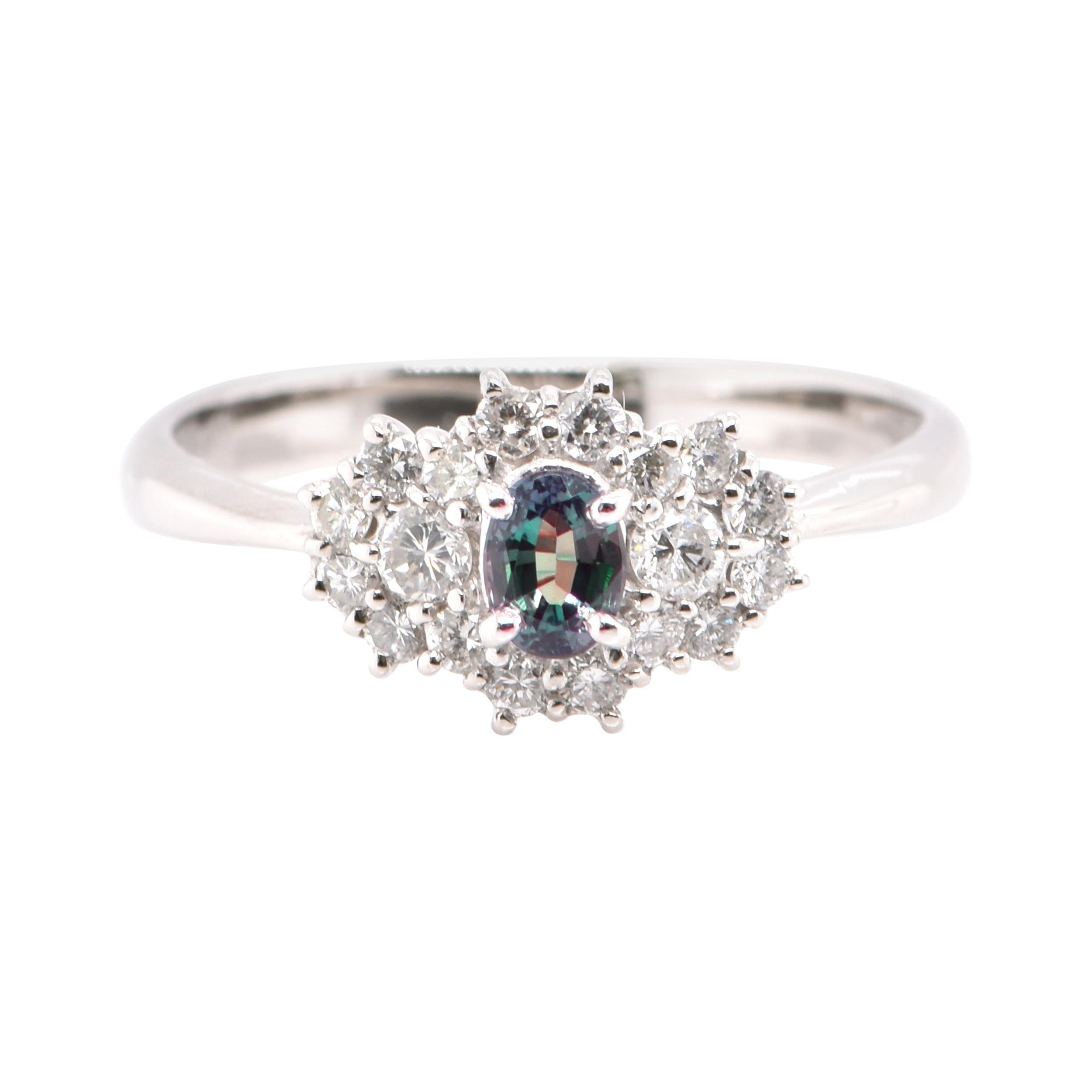0.25 Carat, Natural Color-Changing Alexandrite and Diamond Ring Set in Platinum